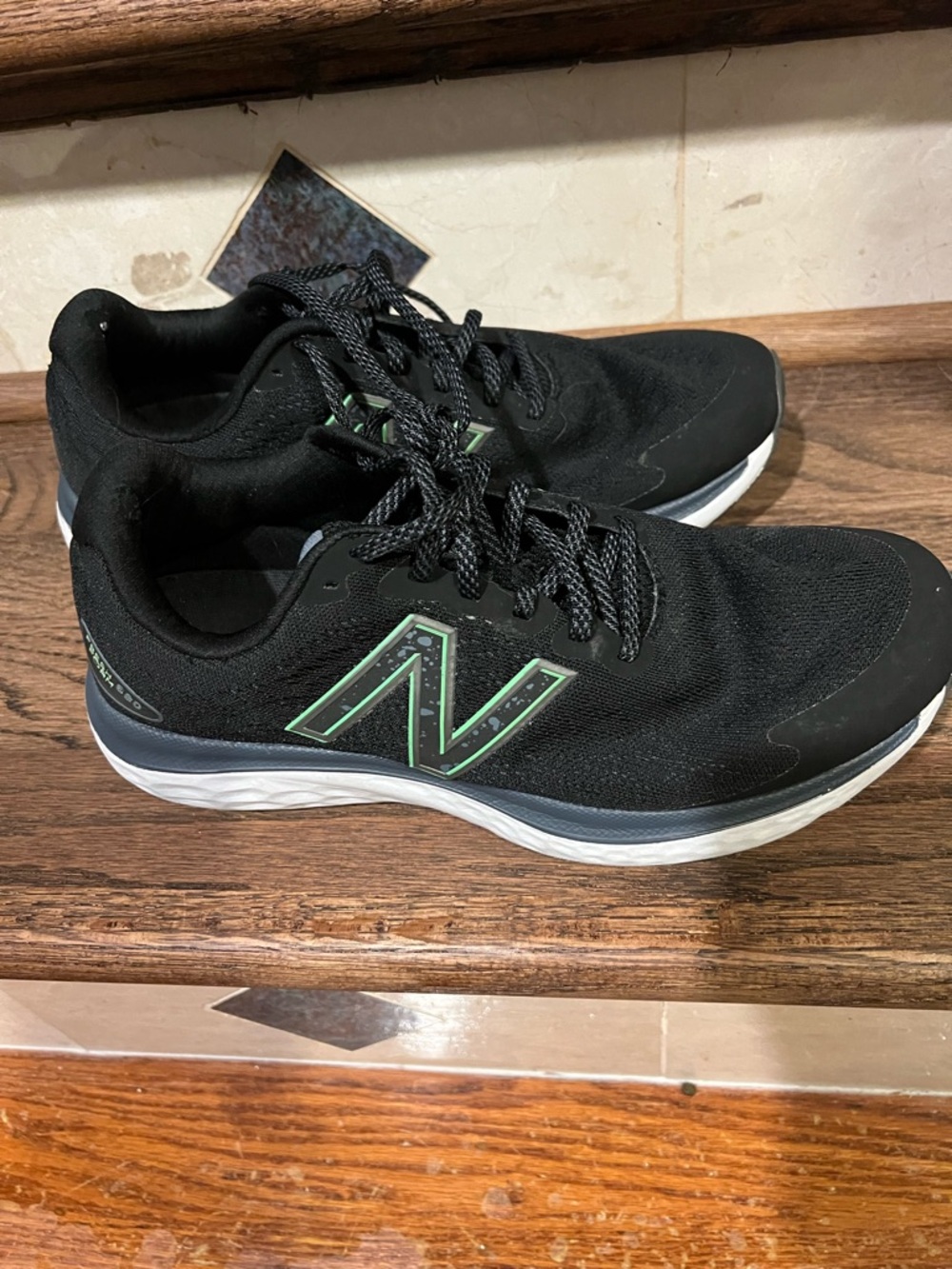 New Balance Men’s Black Sneakers with Green Logo